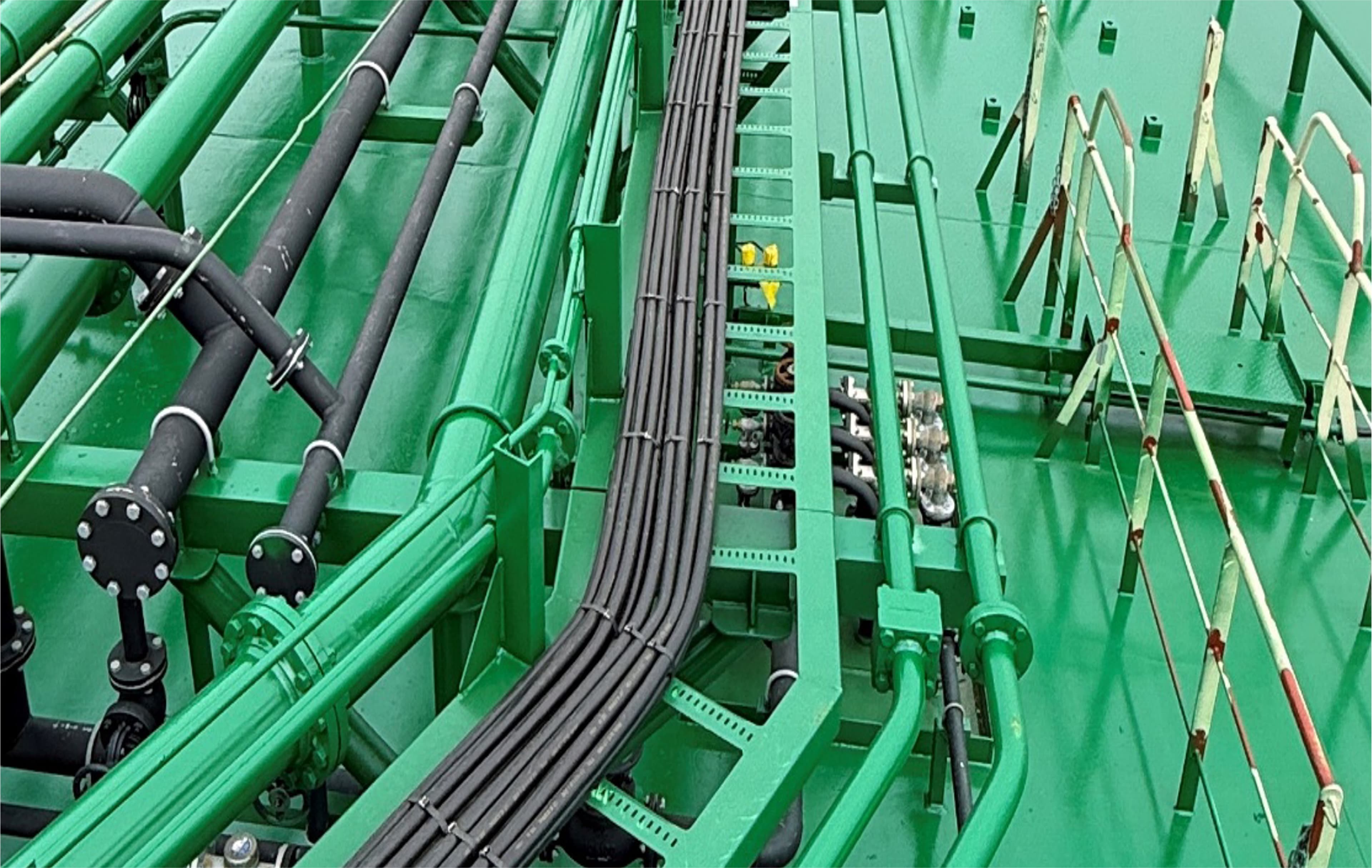 Cables laid into a Diet Cable Tray and held on its supports